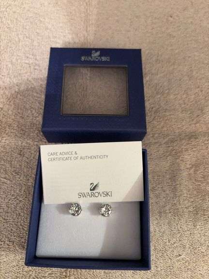 Swarovski stud earrings in original box image