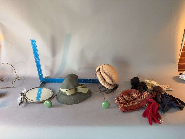 Women’s hats, upright hat stand w articulated hanging hat stand and shaving mirror image