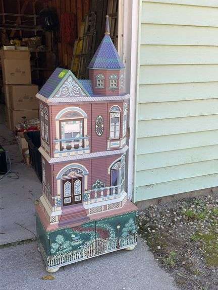 Victorian house styled shelf unit w/ door 22" wide x 55" tall See photos for condition, has some minor damage image