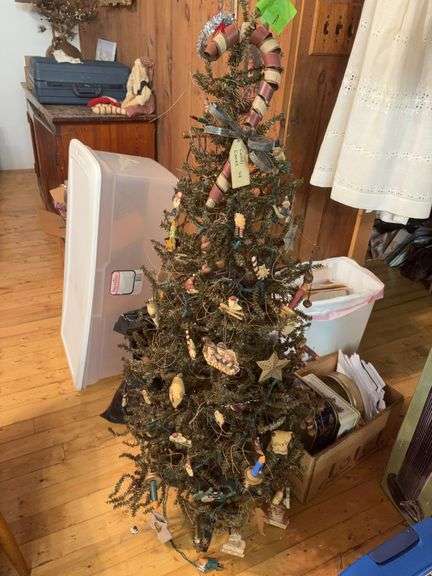 Approx 4’ tall predecorated and prelit Christmas tree image
