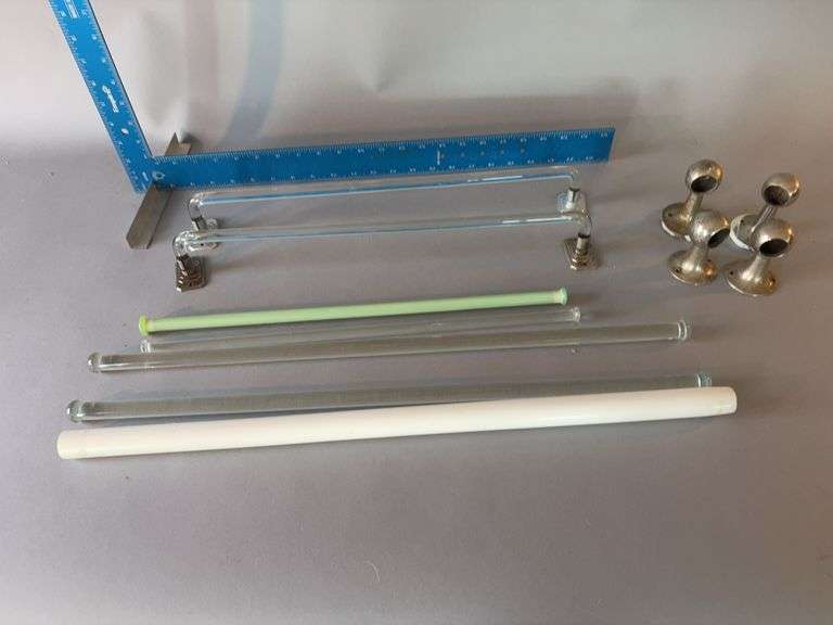 Several towel holders with glass bars image