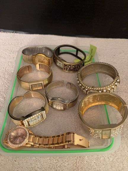 Many blingy watches, bangles image