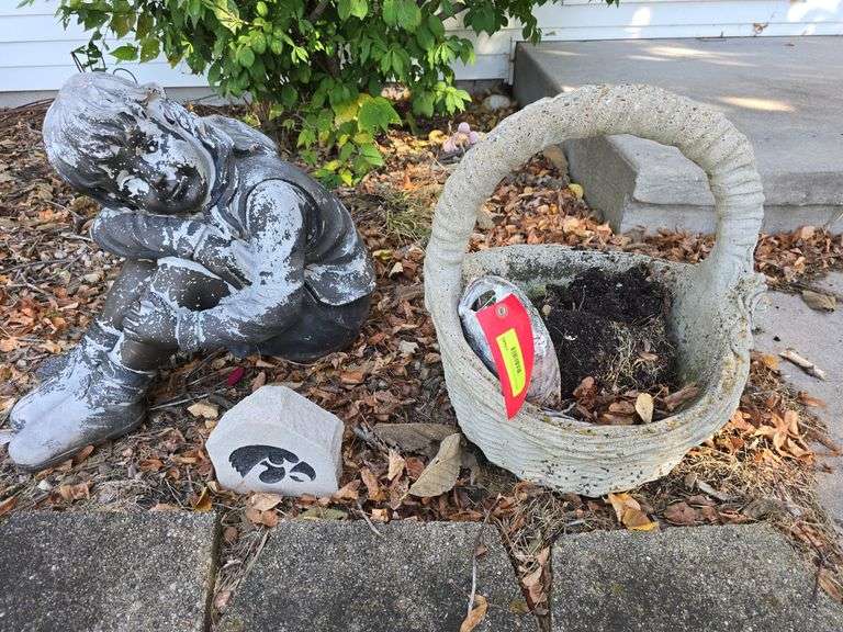 Cement basket, resin girl and Hawkeye stone image