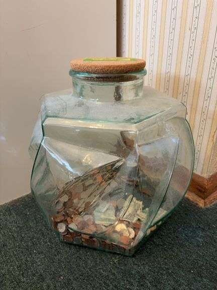 15” tall hexagon glass jar w $$$ inside image
