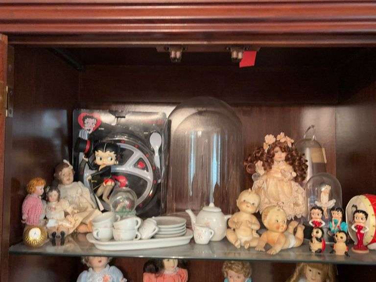 Collectible dolls, large glass dome, Betty Boop, mini tea set, etc image