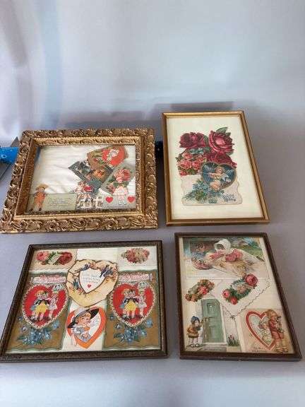 Four picture frames with postcards image
