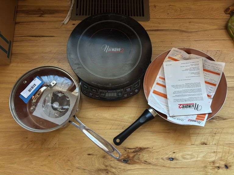 Nuwave 2 induction cooktop and two pans
