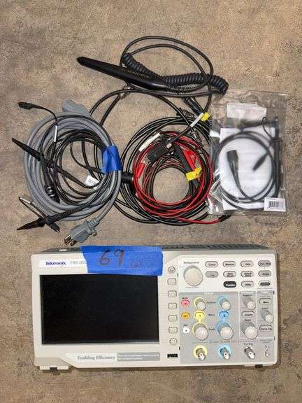 Tektronix TBS 1052B digital oscilloscope 50 MHz 2 channel 1 GS /s digital storage, three probes, power cord and miscellaneous coax cables. image