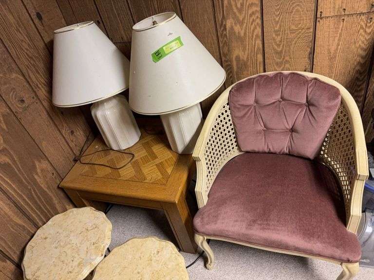 Two table lamps, side table and wrap around chair image