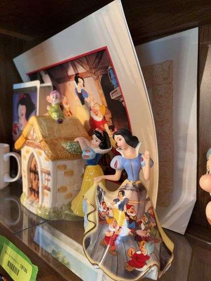 Snow White group includes figurine, teapot, coffee cup, VHS tape, 1994 commemorative lithograph