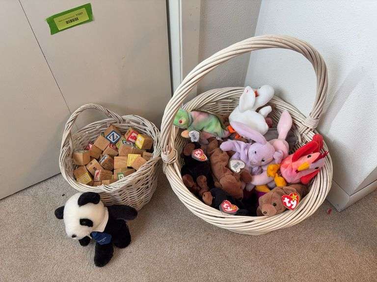 A basket of alphabet blocks and a basket of TY beanie babies image