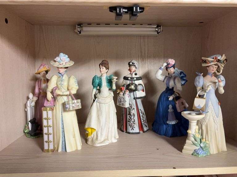 Six Avon Presidents Club Award figurines depicting Mrs PFE Albee, Avons first representative image