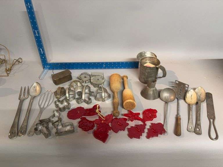 Many old cookie cutters and other kitchen needs image