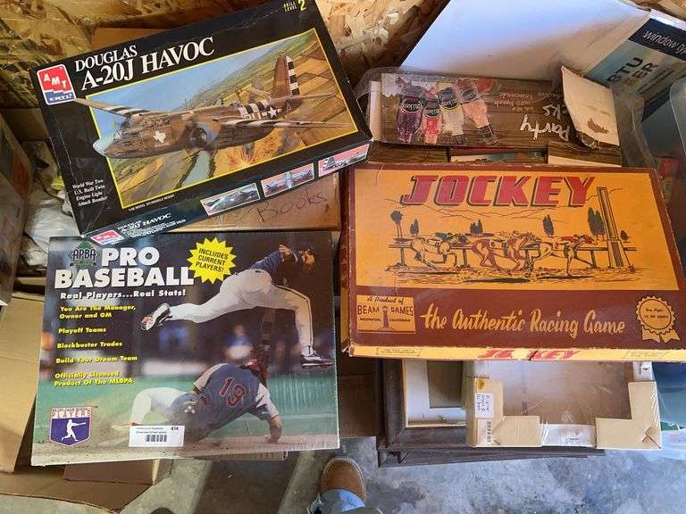 Model airplane kit, pro baseball game, and vintage jockey racing game