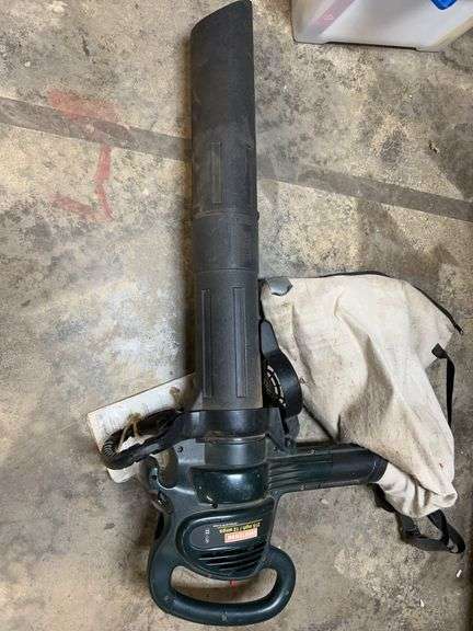 Three clamp on deck rail hooks, one 4-ft shepherd's hook, one 3-ft shepherd's hook, one roll 36 in landscape fabric brown, one roll of burlap 3 ft x 24 ft unopened, four plant support stakes (81in), one post hole digger, one bow saw, Scott seeder/fertilizer, Craftsman blower/shredder with bag. image