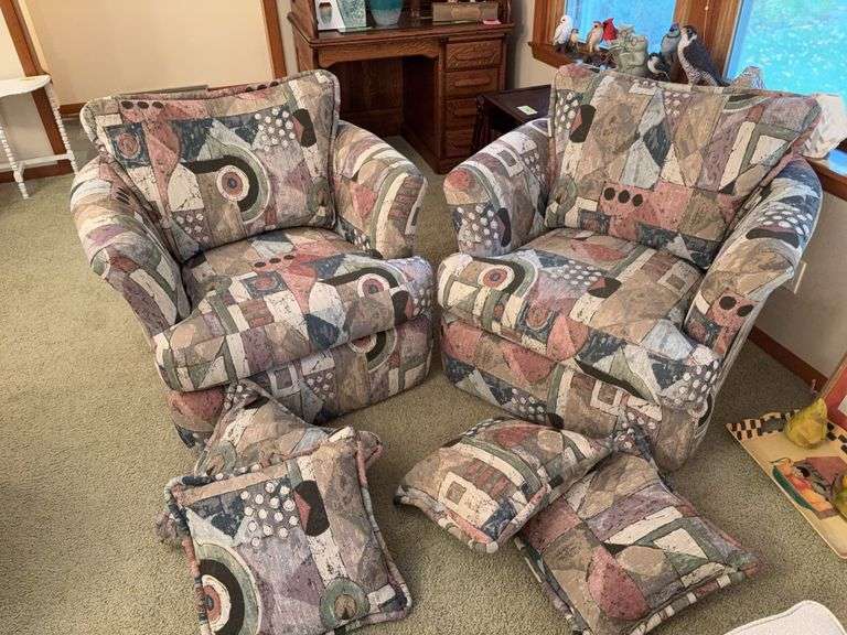 Pair of matching arm chairs and throw pillows image
