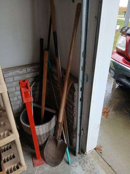 Long handled yard tools, planter, t post puller etc... image
