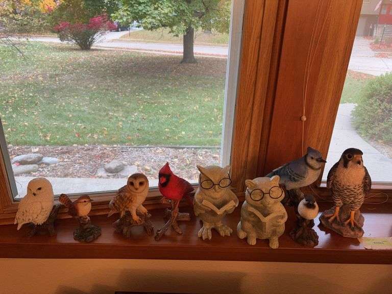 Several resin birds and one varmint image