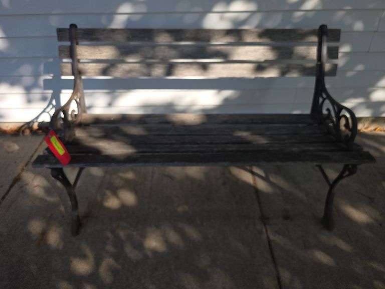 Cast iron and wood slat park bench image