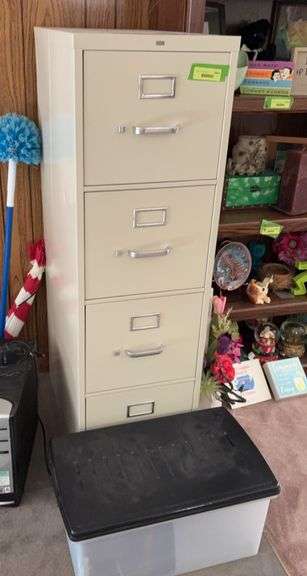 4 drawer letter size filing cabinet w/ lots of hanging files and a plastic file tote image