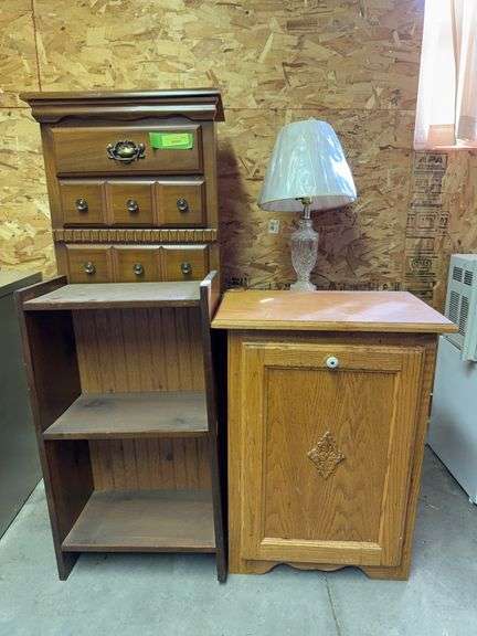 Tall narrow chest of drawers, tip out door trash bin, lamp, bookshelf etc... image
