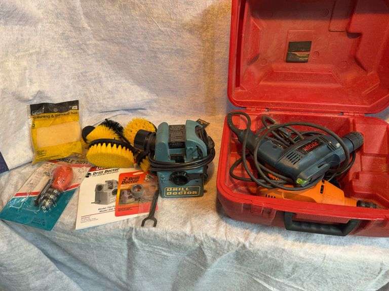 Lot with Chicago electric 1/2-in hammer drill. Ryobi 3/8 drill with variable speed and reverse, keyless chuck, angle drive, various accessories. Drill Doctor Tradesman and extra sharpening wheel. image