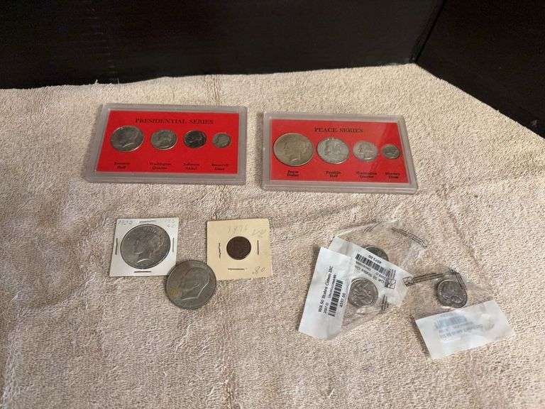 1922 Peace silver dollar, 1971 Eisenhower dollar, 1896 Indian head penny, 3 state quarters, Peace Series and Presidential Series image