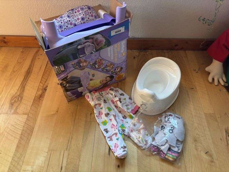 Potty chair, purple sit and snack booster seat, and cloth doll