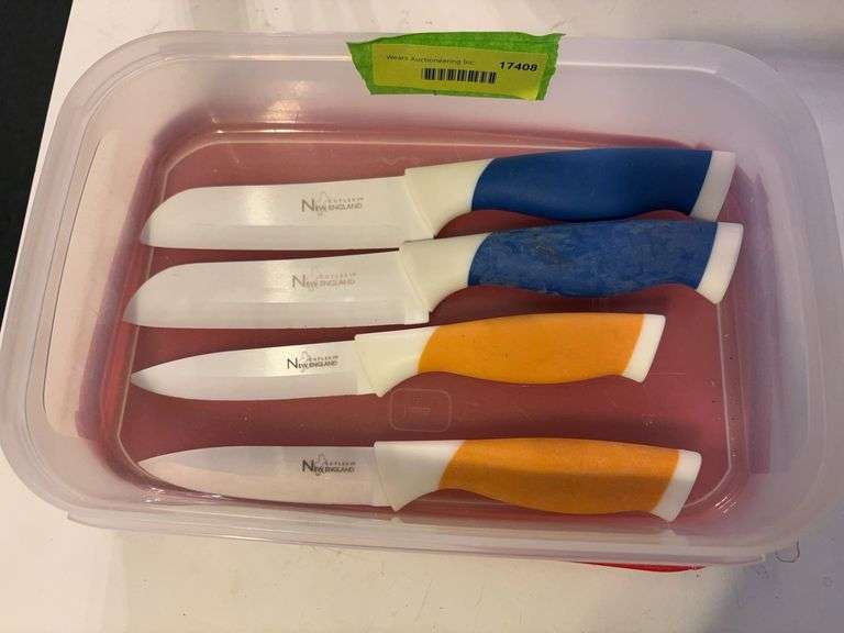 Tupperware container w 4 New England Cutlery knives image