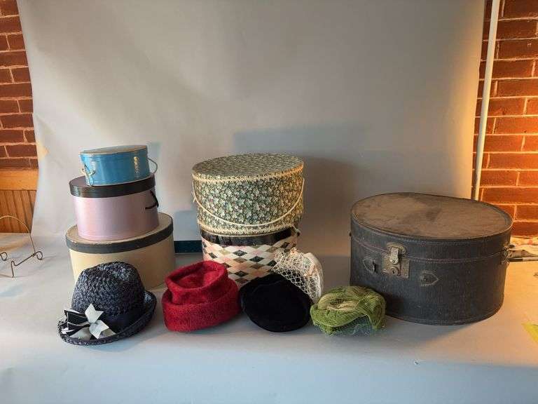 Hat boxes and hats image