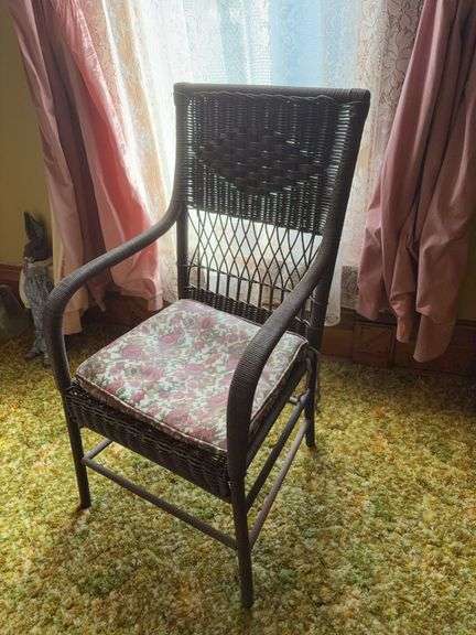 Brown wicker chair w cushion image
