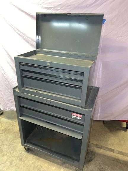 Craftsman Evolve lower tool cabinet, two drawers and one large bottom space that measures 26-1/2 wide by 30- 1/2 in high by 14 in deep no name. Upper tool cabinet, three drawers and top shelf 22x13 and 1/2x12 in deep, Craftsman drawer liners, one opened and one unopened, tap and die set, sockets and wrenches SAE/  metric socket sets. image