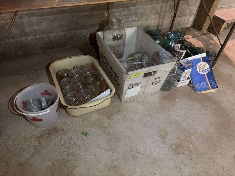 Clear and blue glass canning jars, zinc lids, canning books image