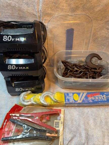 Lot with 10-ft log chain 1/4-in links small and large hooks, Reese 15-ft tow strap with hooks 10,000 lb, replacement battery cable clamps Craftsman router, router table 1/2 horsepower, Kobalt 80 volt battery charger x3 image