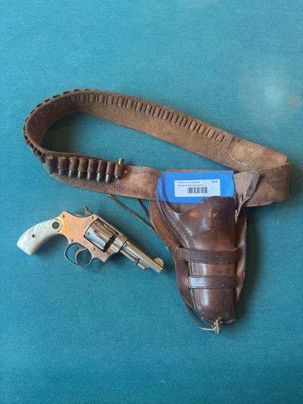Smith and Wesson 32 long serial #235483 pearl handle revolver with ammo belt holster image