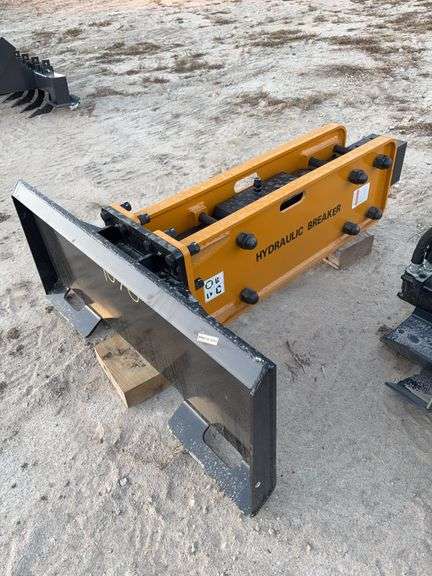 Concrete Breaker	WOLVERINE CB-11-750F	 Skid Steer Concrete Breaker Attachment  Impact Energy Class:750 ft lb Operating Weight:1230 lbs Length With Tool:69 in Overall Width :51 in Working Steel Diameter:2.67 in Blows Per Minute (variable):620 - 1150 Oil Flow Range:11.9 - 21.9 gpm Operating Pressure Range:1,566 - 3000 psi Relief Pressure:2,310 - 2,610 psi, MOUNT VERNON image