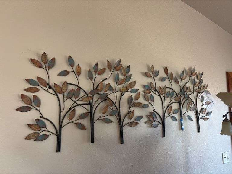 Two hanging metal wall art trees