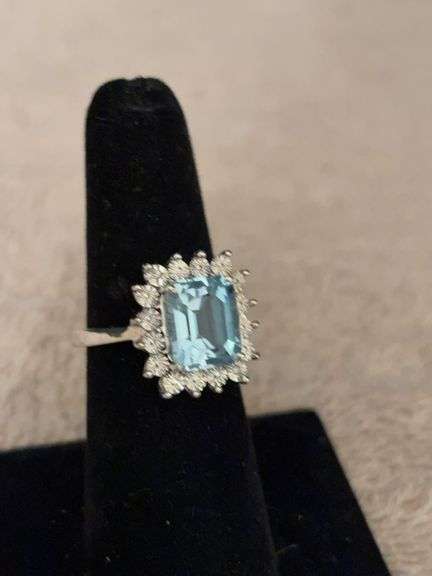 Blue Topaz with diamonds. Size approximate 7 image