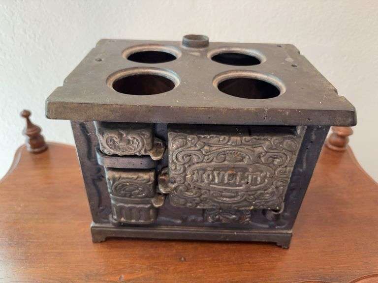Novelty cast iron mini cookstove, incomplete 8.75" wide x 6.75" tall image
