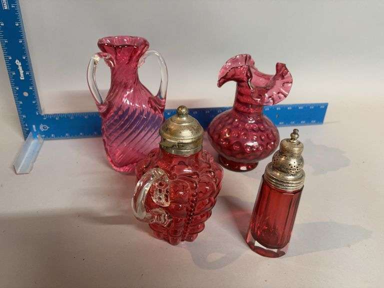 Four pieces cranberry glass different patterns image
