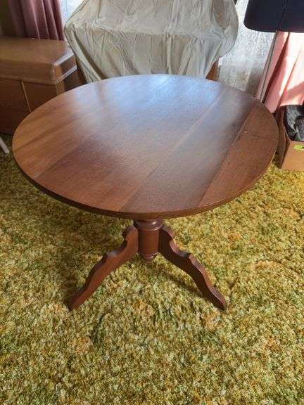 Oval walnut parlor table 28x31x28H image
