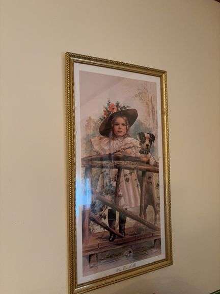 Two framed prints “What can it Be” in modern frame w plexiglass and “The Little Captive” image