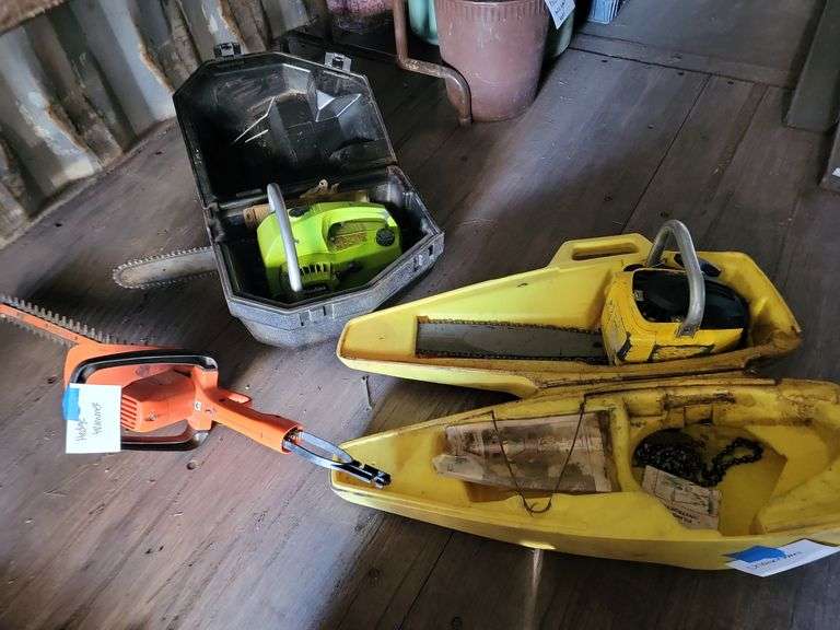 Two chainsaws and trimmer