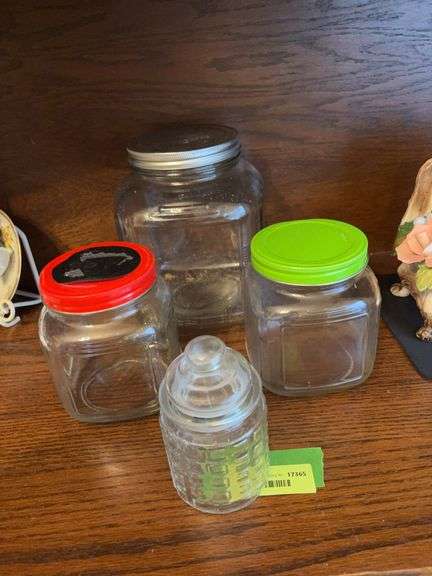 Three clear glass jars and basket pattern candy jar image