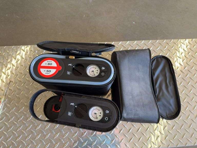 Two tire emergency inflation kits1 new, 1 missing parts