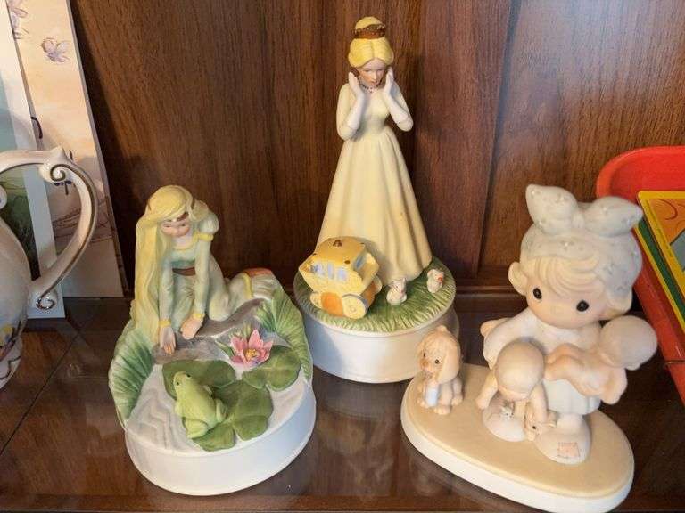 Two Mann music boxes and a Precious Moments figurine