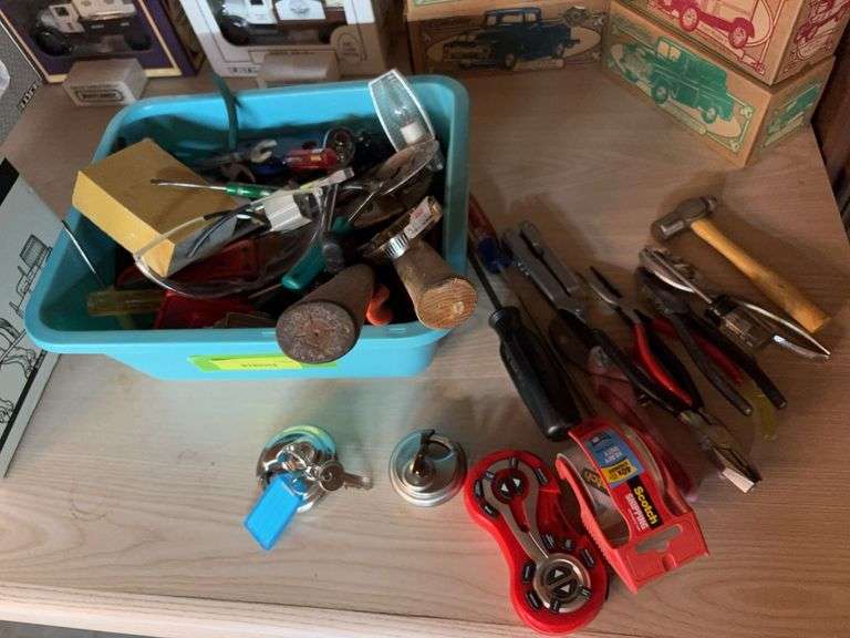 Dishpan full of tools and 4’ level image