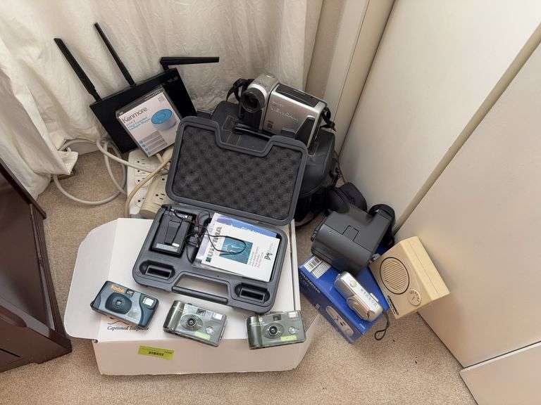 Video camera, surge protectors, cameras, Kenmore voice controlled intelligent shopper, etc image