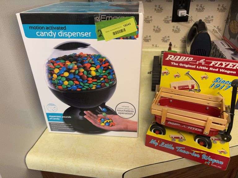 Motion activated candy dispenser and Radio Flyer “My Little Trav-Ler Wagon” image
