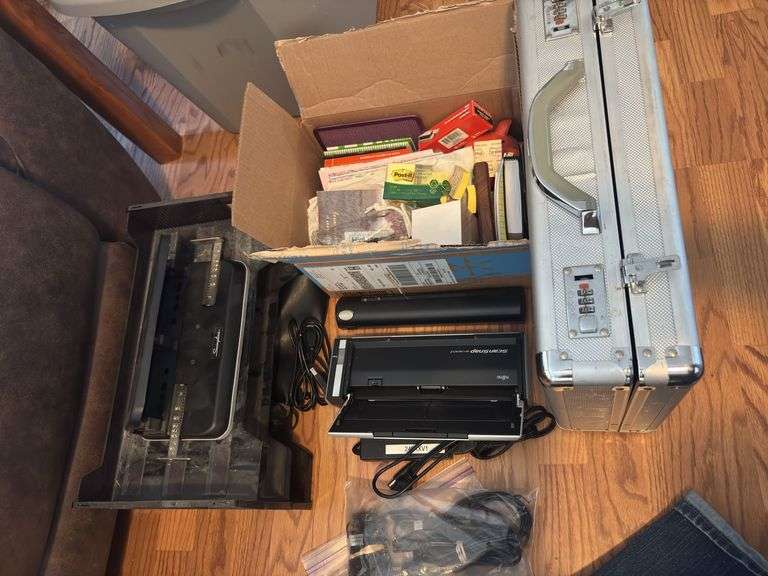 Office supplies, including briefcase, scanner, hole punch